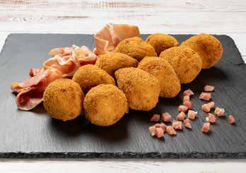 Premium croquettes on a slate tray